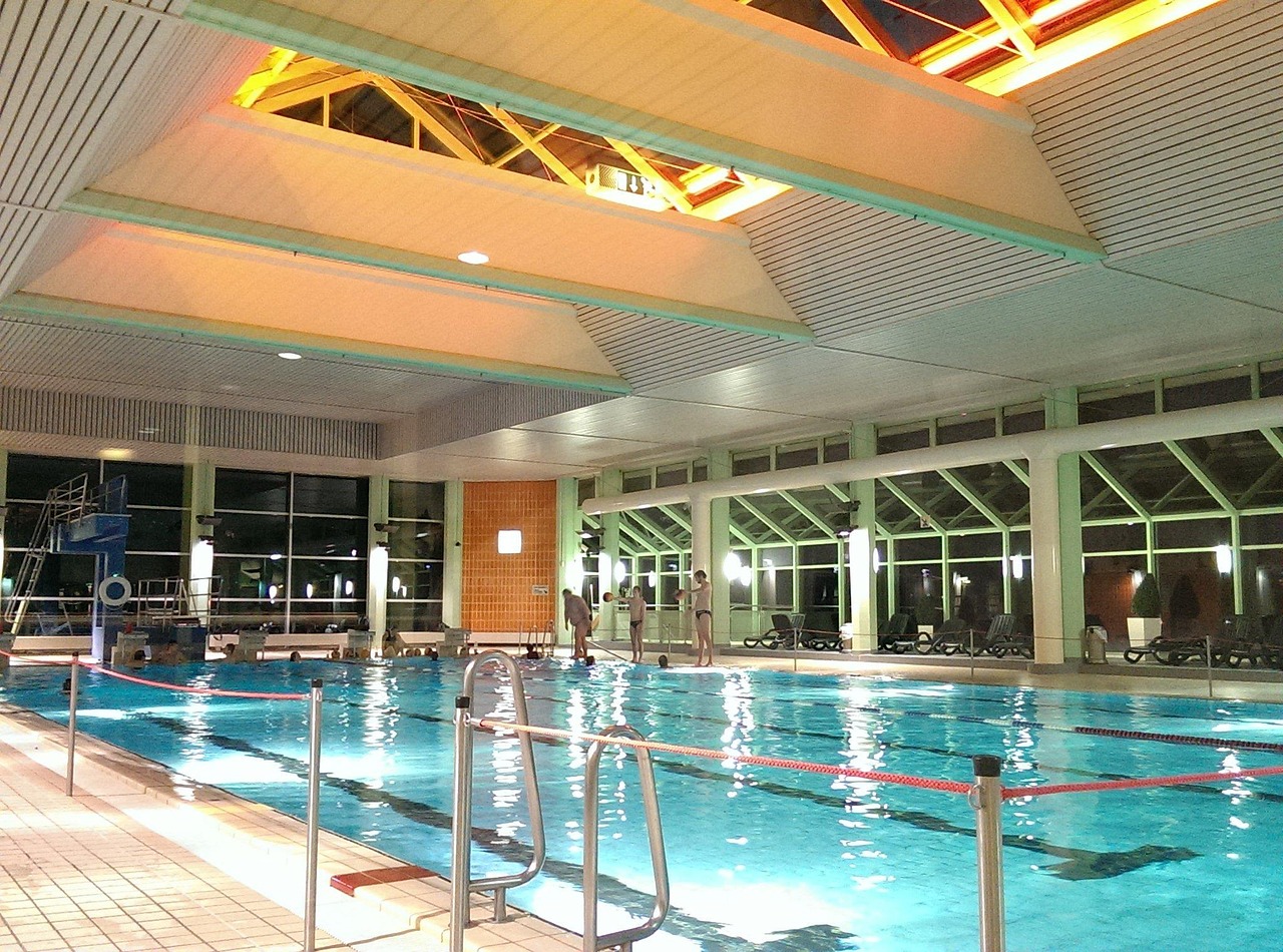 An aging Cape Coral pool being assessed for resurfacing or rebuilding